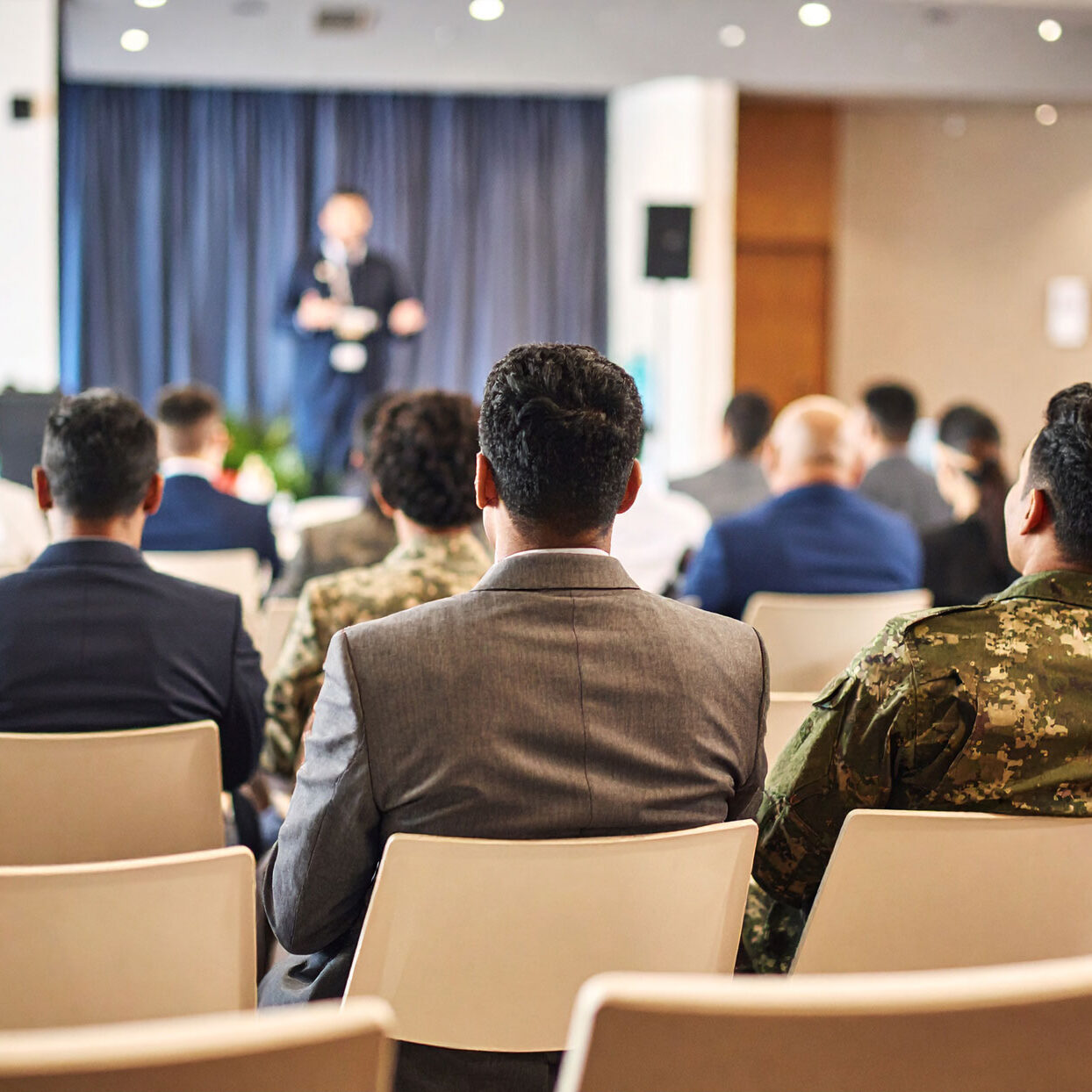 people-seating-a-conference-at-a-hotel-conference-room,-business-dressed-up people-seating-a-conference-at-a-hotel-conference-room,-business-dressed-up