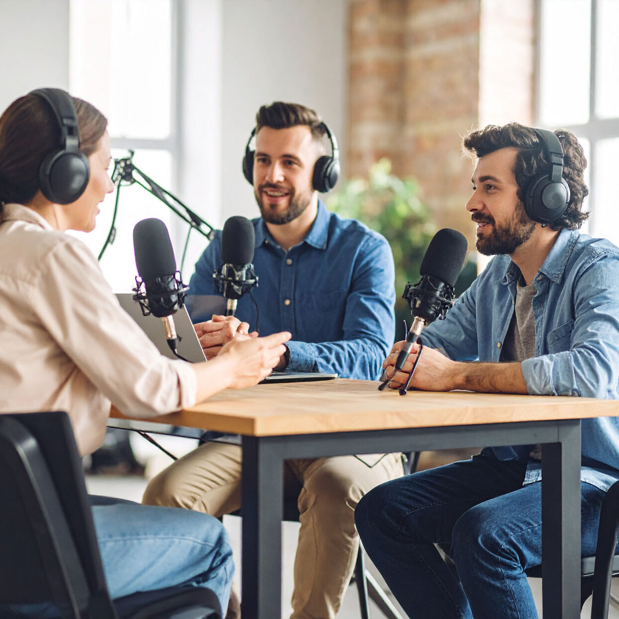 video-production-team-filming-a-video-podcast-with-3-people-seating-in-a-modern-podcast video-production-team-filming-a-video-podcast-with-3-people-seating-in-a-modern-podcast